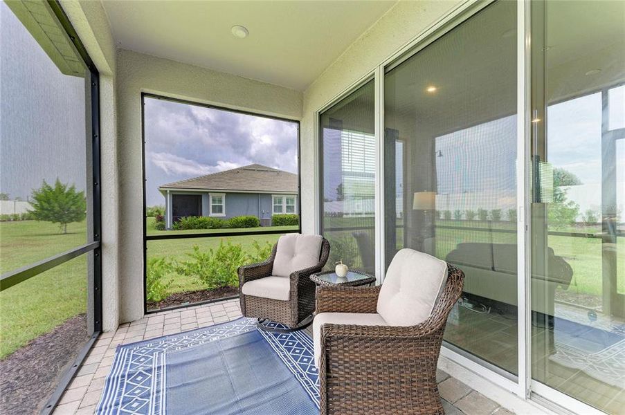 Exterior details and patio area of a home in Wellen Park, Venice (Image 25).