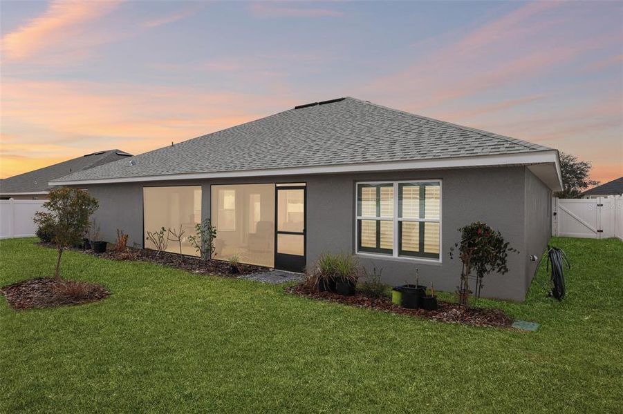 Exterior details and patio area of a home in Oaks at Ocala Crossings, Ocala (Image 21).