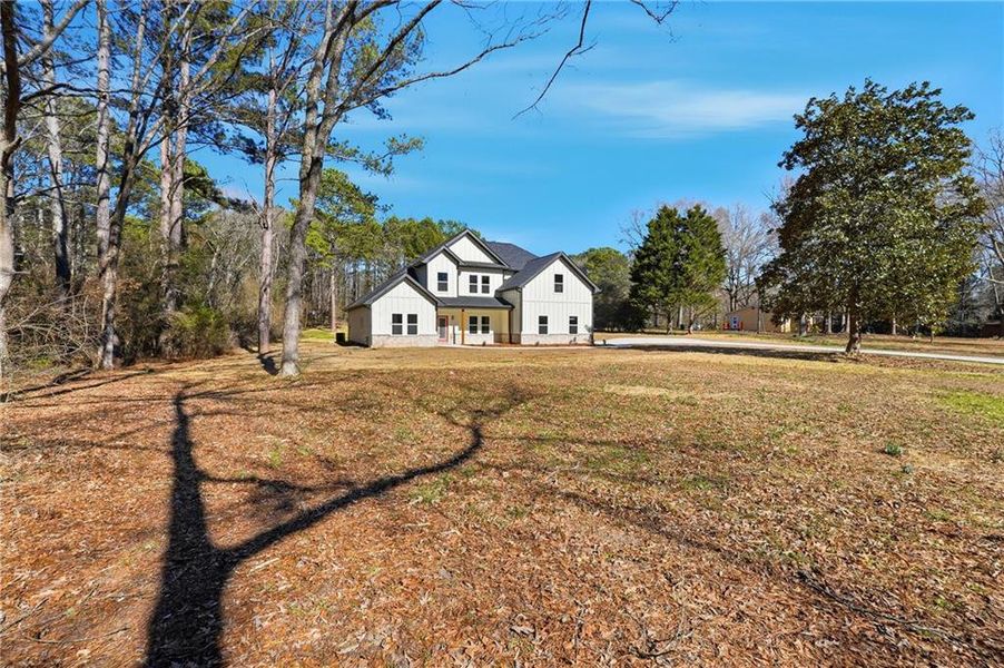 Front exterior of a new home in , Hampton, GA, highlighting curb appeal (Image 21). Front exterior of a new home in , Hampton, GA, highlighting curb appeal (Image 21).