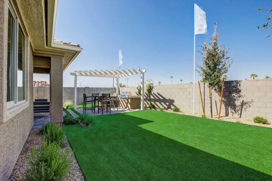 Front exterior of a new home in Castillo at Anderson Parc, Buckeye, AZ, highlighting curb appeal (Image 2). Front exterior of a new home in Castillo at Anderson Parc, Buckeye, AZ, highlighting curb appeal (Image 2).