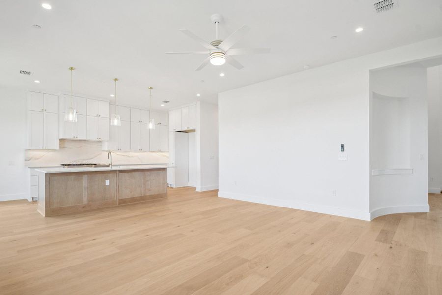 Spacious, unfurnished interior of a new home in Milky Way at River Place, Austin (Image 21).