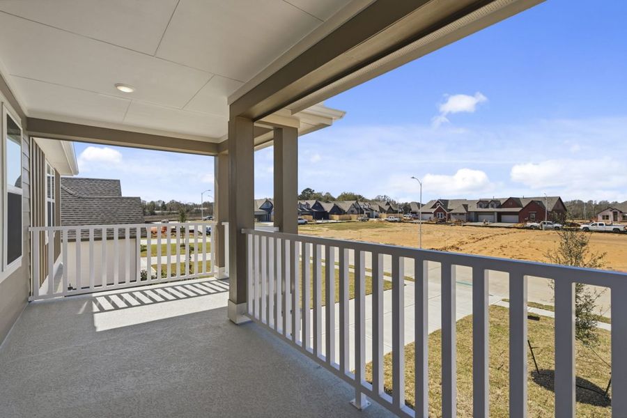 Exterior details and patio area of a home in Hunters Crossing, Sealy (Image 16).