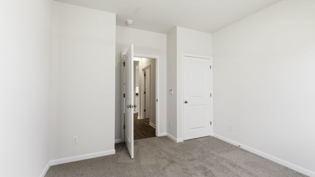 Spacious, unfurnished interior of a new home in Tap Root Farms, Fletcher (Image 20).