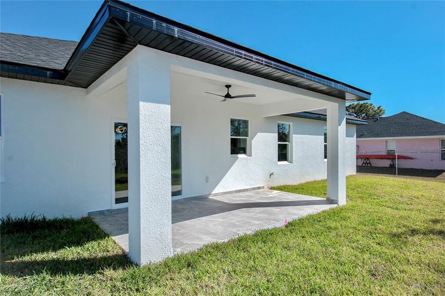 Exterior details and patio area of a home in , Sebring (Image 3).