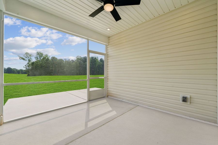 Exterior details and patio area of a home in Madison at Buice Lake, Acworth (Image 44).