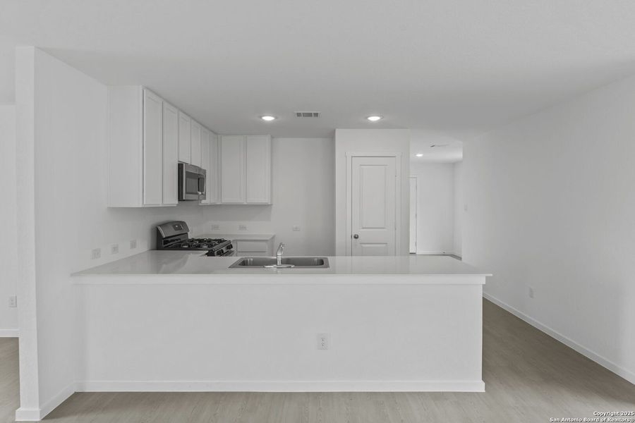 Furnished interior view inside a new home in Waterwheel: Cottage Collection, San Antonio (Image 13). Furnished interior view inside a new home in Waterwheel: Cottage Collection, San Antonio (Image 13).