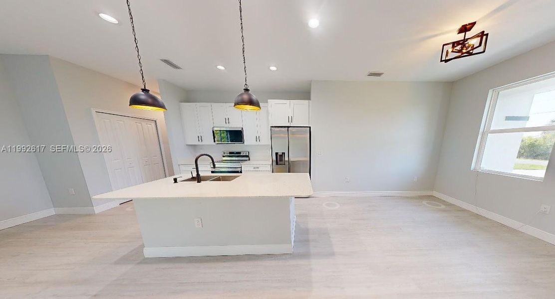 Furnished interior view inside a new home in , Port Charlotte (Image 5).
