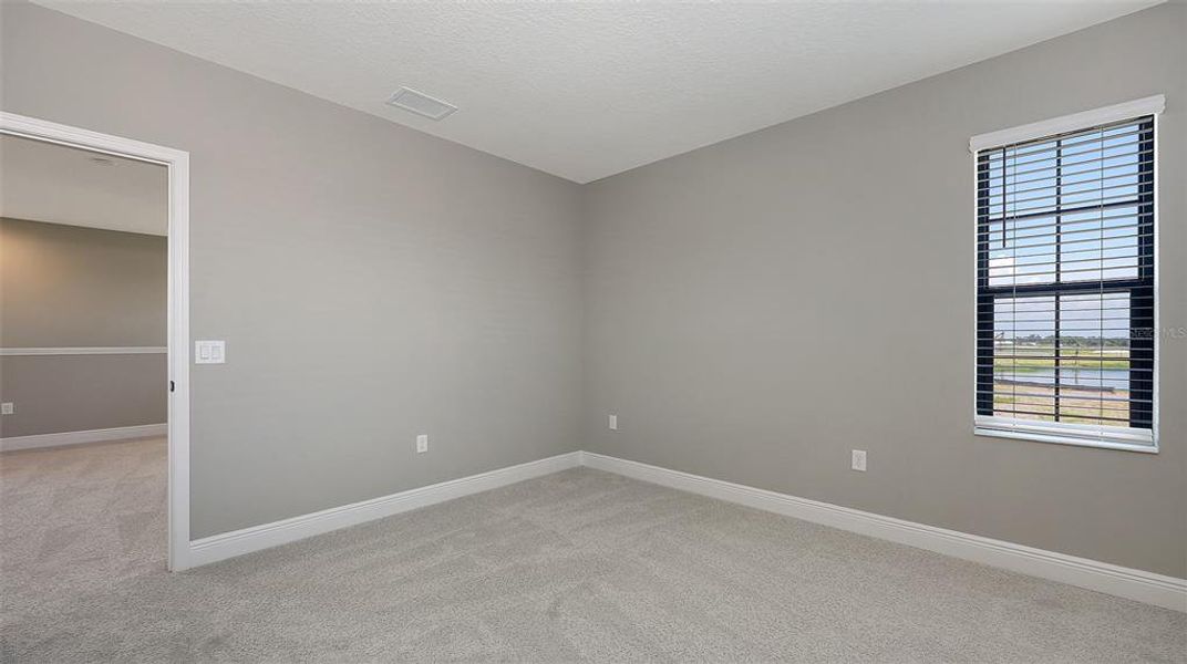 Spacious, unfurnished interior of a new home in Palm Grove, Lakewood Ranch (Image 18).