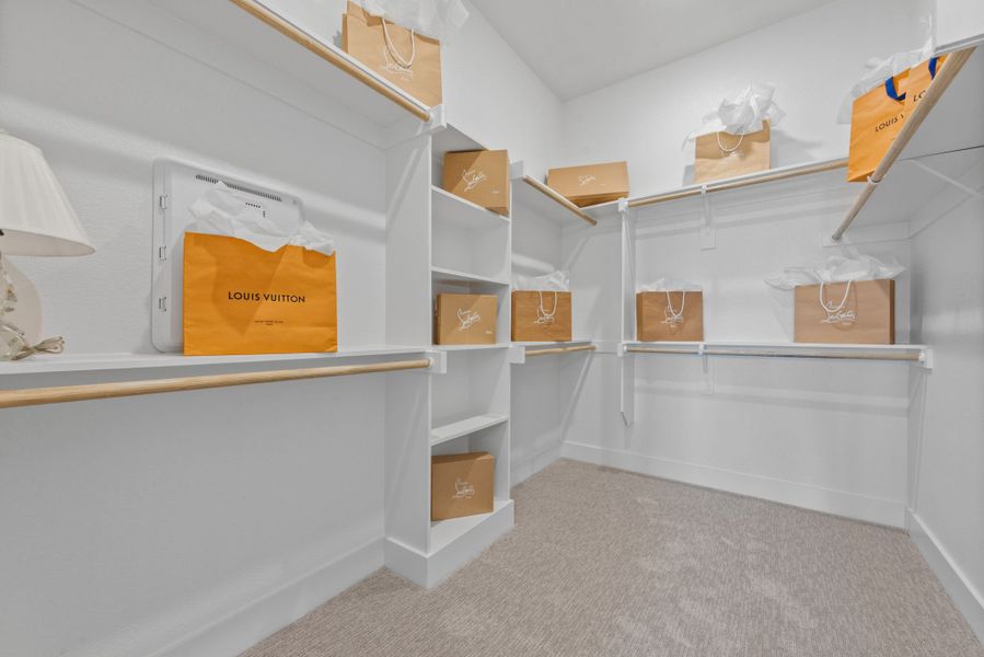 Representative furnished interior of a home built from the Plan 2 by Monarch Homes in Royal Court, Frisco (Image 23).