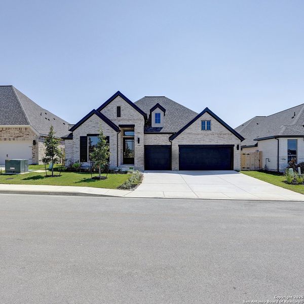 Front exterior of a new home in Kallison Ranch 60', San Antonio, TX, highlighting curb appeal (Image 25).