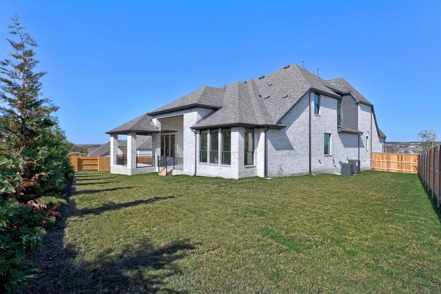 Exterior details and patio area of a home in Palmera Ridge: 80ft. lots, Leander (Image 27).