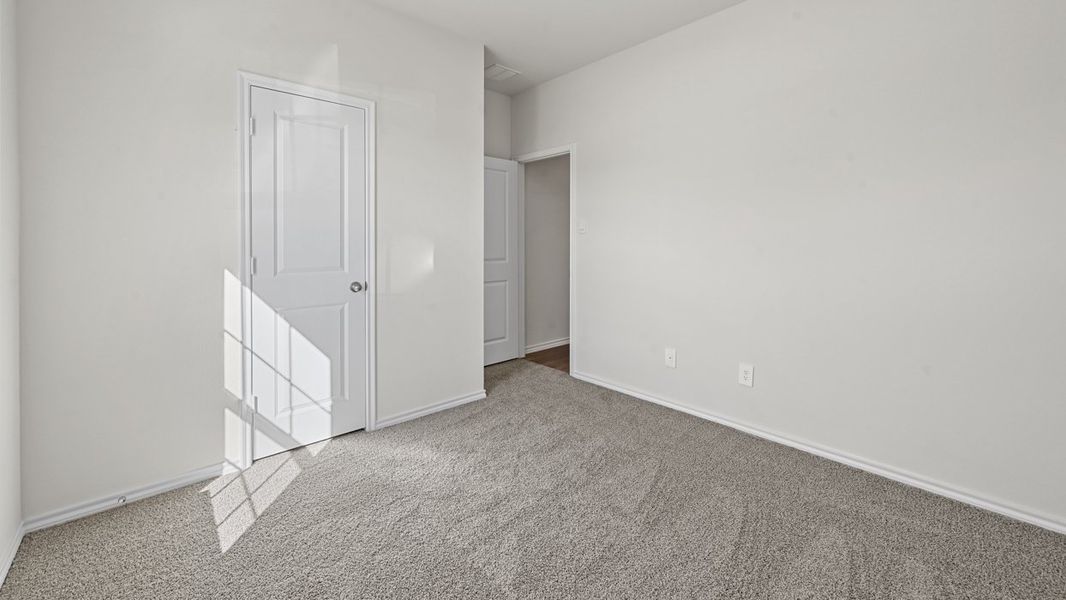 Spacious, unfurnished interior of a new home in Crane Crossing, Crandall (Image 22).