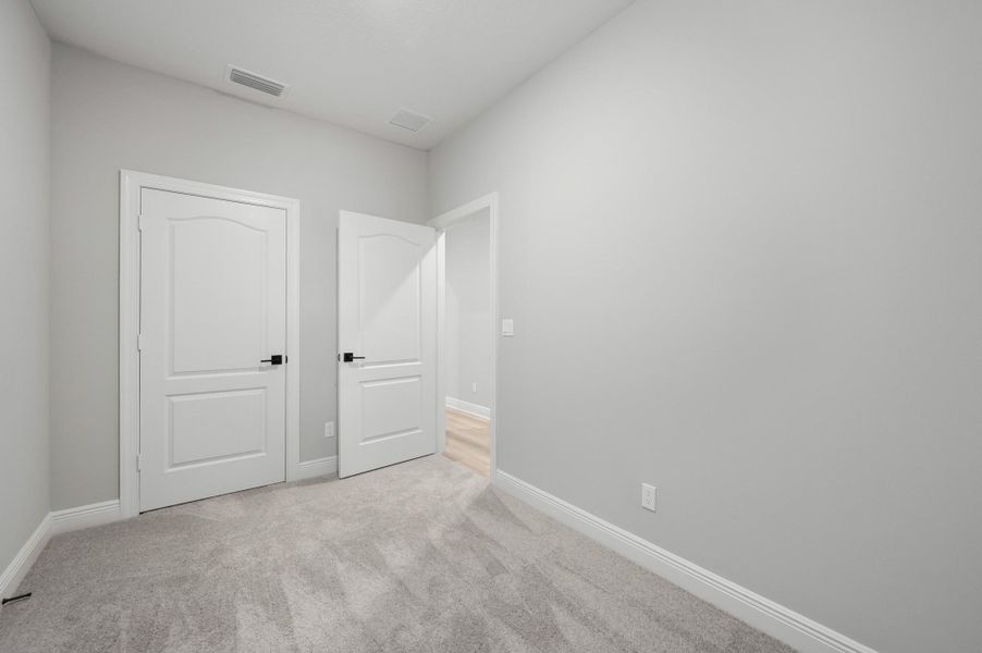 Furnished interior view inside a new home in Celebration Pointe, Fort Pierce (Image 8).
