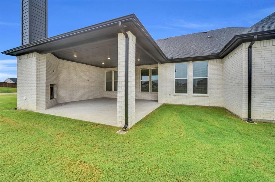 Front exterior of a new home in Springside Estates II, Waxahachie, TX, highlighting curb appeal (Image 1). Front exterior of a new home in Springside Estates II, Waxahachie, TX, highlighting curb appeal (Image 1).
