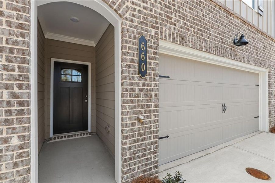 Exterior details and patio area of a home in River Walk Place, Lawrenceville (Image 3).