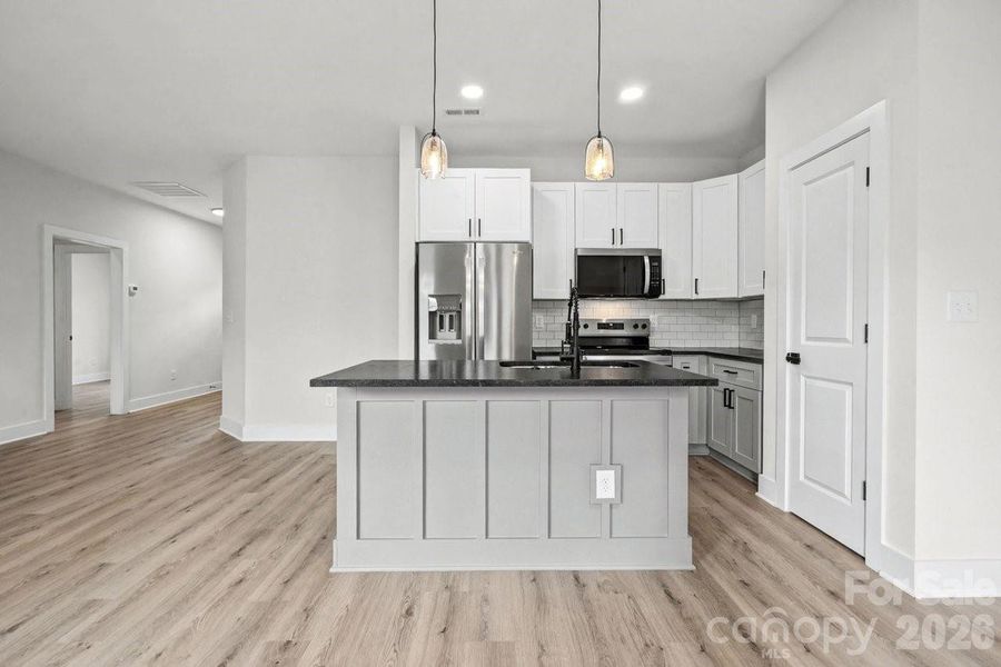 Furnished interior view inside a new home in , Charlotte (Image 4). Furnished interior view inside a new home in , Charlotte (Image 4).