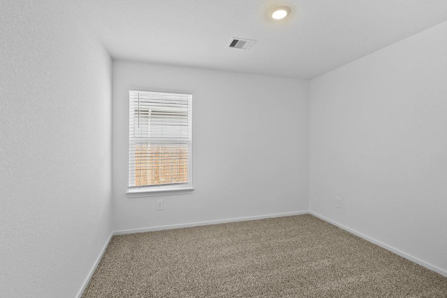 Spacious, unfurnished interior of a new home in The Canopies, Splendora (Image 12).