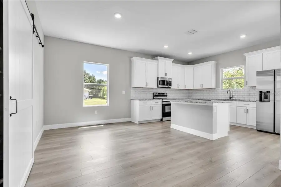 Furnished interior view inside a new home in , Punta Gorda (Image 13).