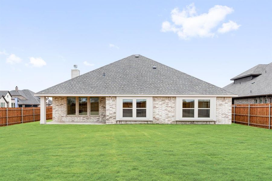 Exterior details and patio area of a home in Sunrise at Garden Valley, Waxahachie (Image 20).