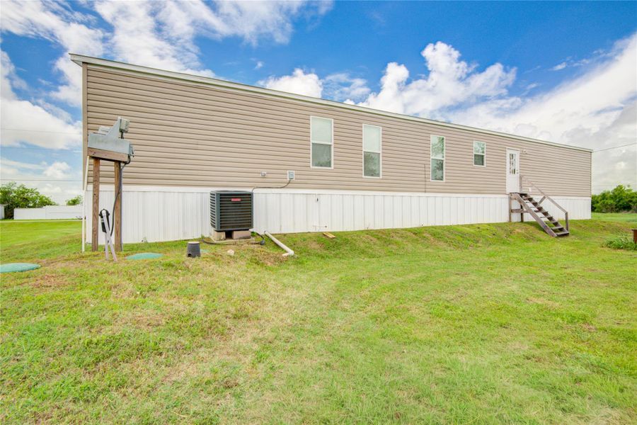 Exterior details and patio area of a home in , Brazoria (Image 25).