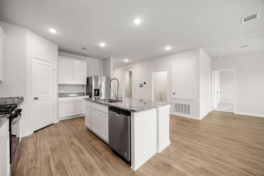 Furnished interior view inside a new home in Granger Pines, Conroe (Image 10).