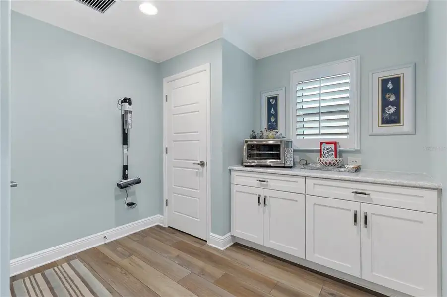 Furnished interior view inside a new home in , The Villages (Image 16).
