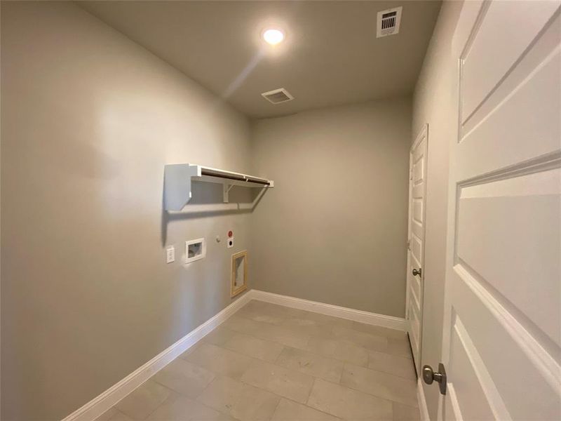 Laundry room with extra room for a 2nd fridge or storage