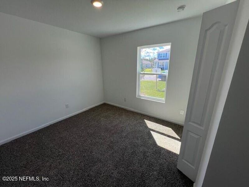 Spacious, unfurnished interior of a new home in Sawmill Branch Express, Palm Coast (Image 36).