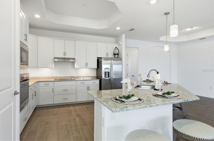 Furnished interior view inside a new home in Heritage Landing, Punta Gorda (Image 16).
