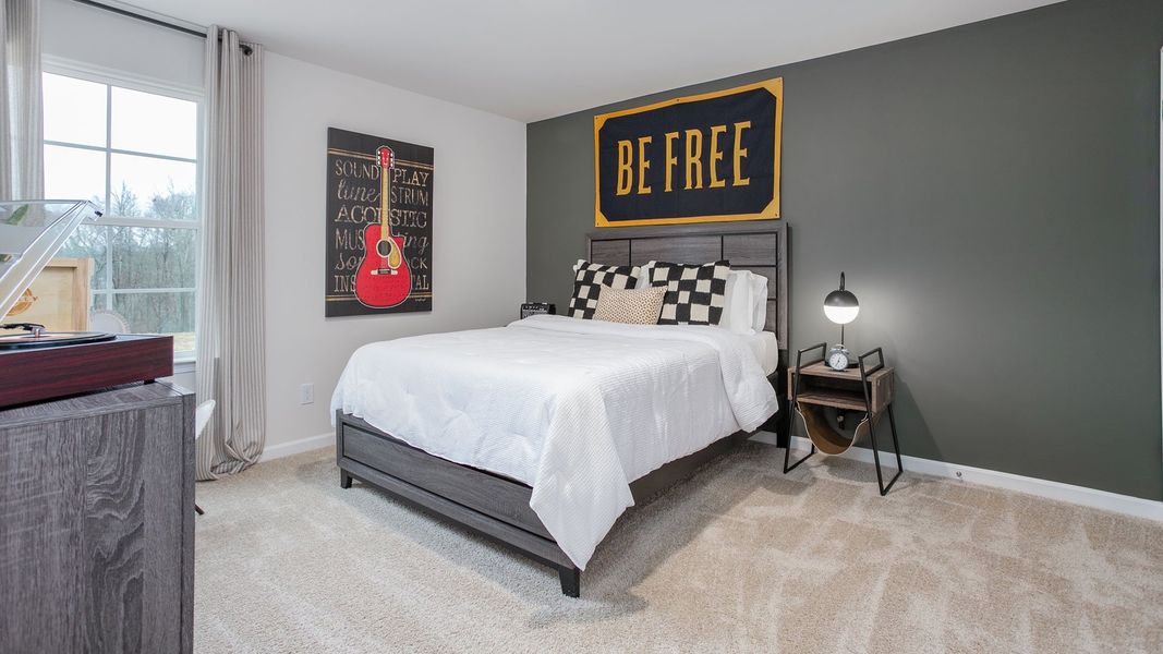Representative furnished interior of a home built from the PENWELL by D.R. Horton in Preston Oaks, King (Image 16).