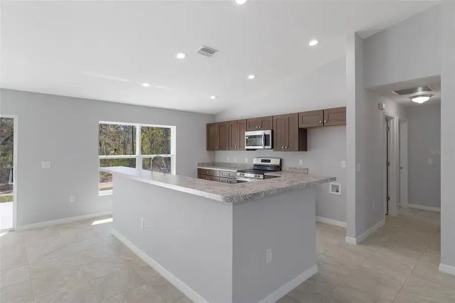 Furnished interior view inside a new home in , Brooksville (Image 5).