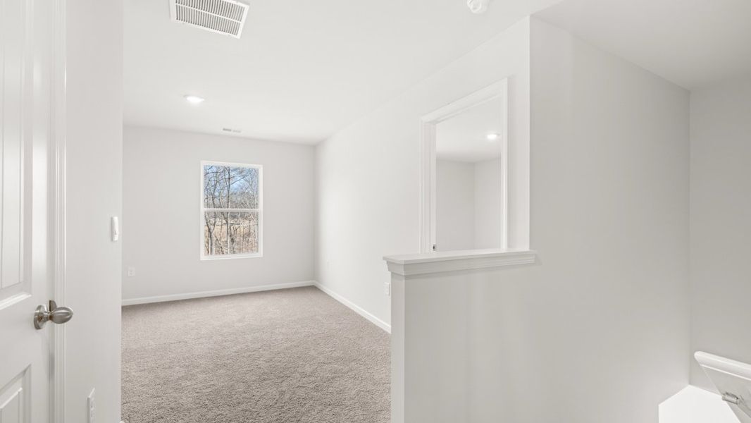 Representative unfurnished interior of a home built from the Penwell by D.R. Horton in Oakleigh Glen, Dallas (Image 18).