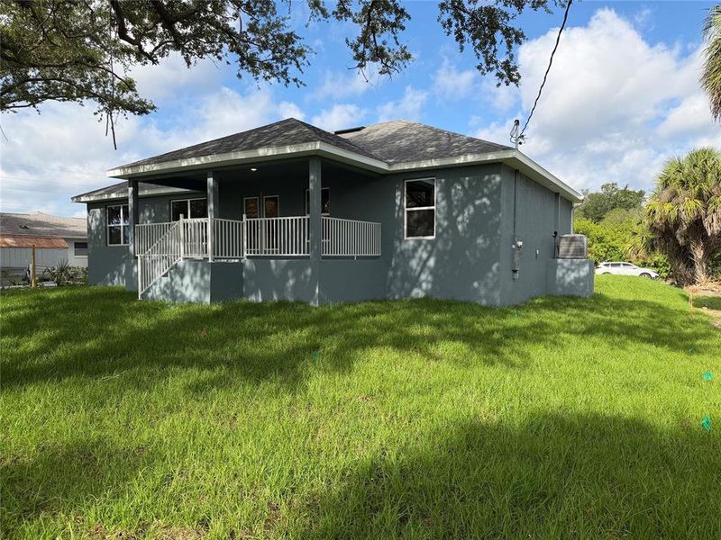Exterior details and patio area of a home in Port Charlotte, Port Charlotte (Image 11).
