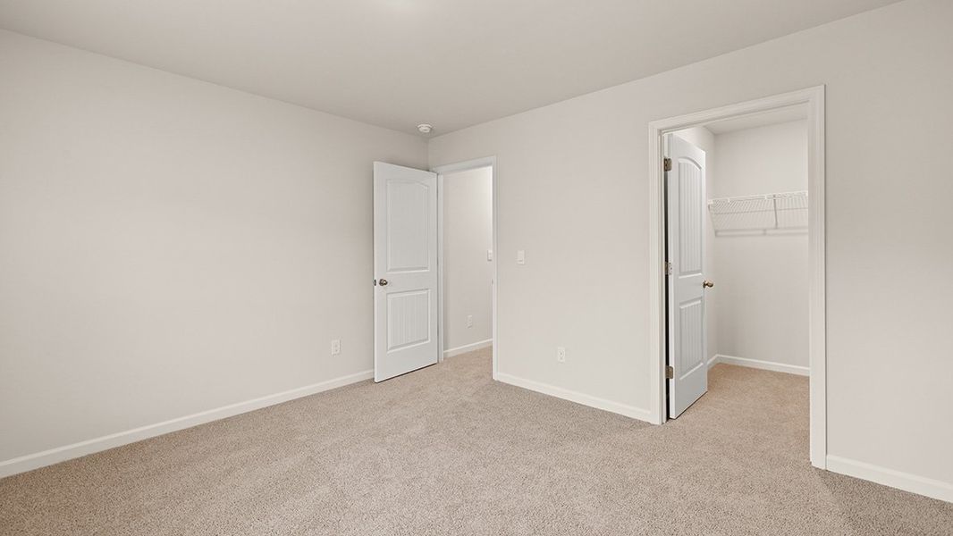 Representative unfurnished interior of a home built from the Mansfield by D.R. Horton in Northwoods at Mirror Lake, Villa Rica (Image 35).