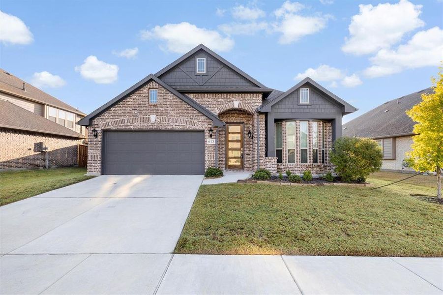 Front exterior of a new home in , Little Elm, TX, highlighting curb appeal (Image 2). Front exterior of a new home in , Little Elm, TX, highlighting curb appeal (Image 2).