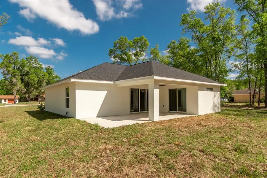 Exterior details and patio area of a home in , Ocala (Image 27).