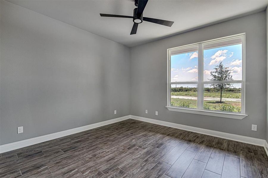 Unfurnished room featuring ceiling fan