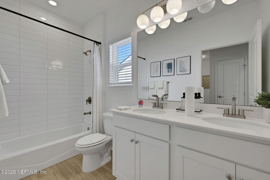 Furnished interior view inside a new home in Seminole Trace, Palm Coast (Image 6).