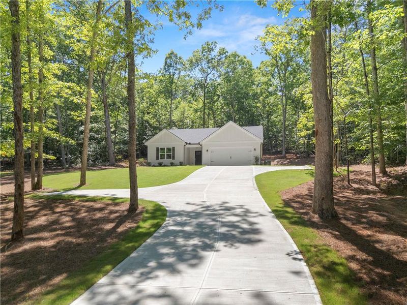 Front exterior of a new home in , Martin, GA, highlighting curb appeal (Image 21). Front exterior of a new home in , Martin, GA, highlighting curb appeal (Image 21).