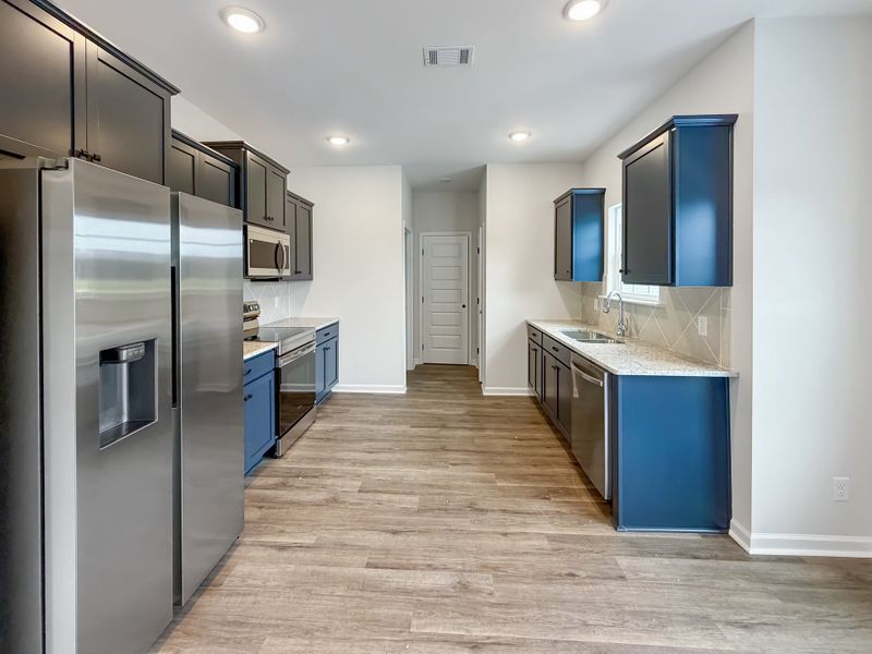 Furnished interior view inside a new home in Tranquil South, Hinesville (Image 6).