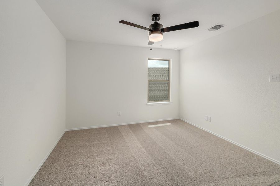 Spacious, unfurnished interior of a new home in River Bluff, Leander (Image 28).