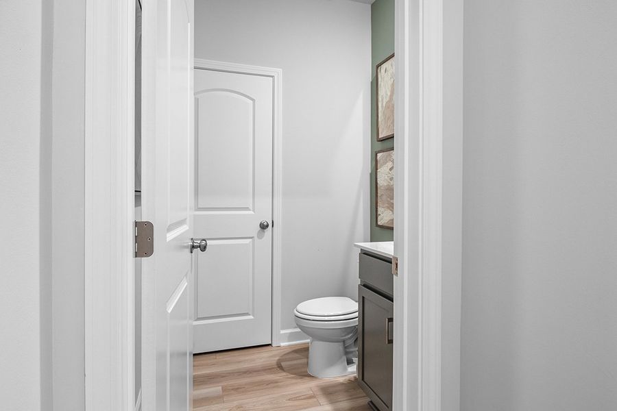 A bathroom with white doors. A bathroom with white doors.