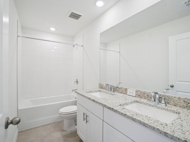 Furnished interior view inside a new home in Two Rivers - Classic Series, Zephyrhills (Image 10).