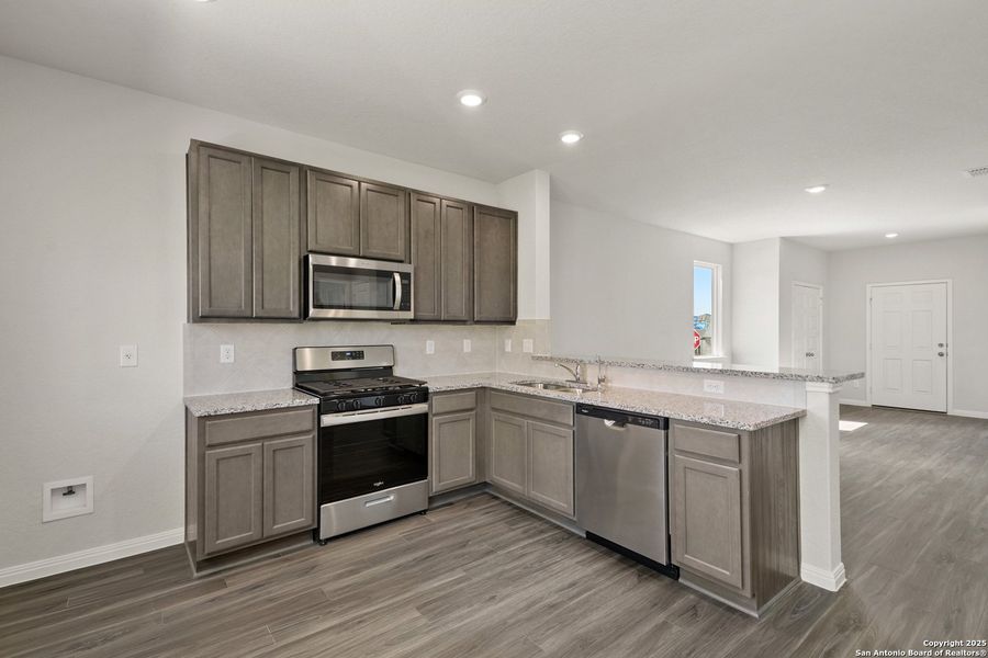 Furnished interior view inside a new home in Hunters Ranch, San Antonio (Image 9). Furnished interior view inside a new home in Hunters Ranch, San Antonio (Image 9).
