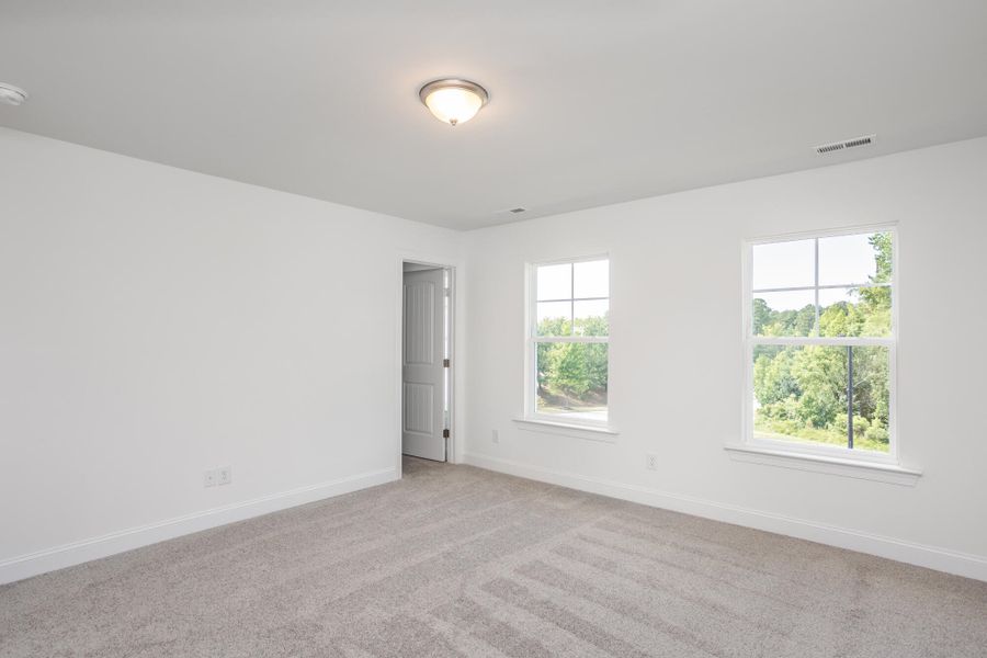 Spacious, unfurnished interior of a new home in Enclave at Traditions Townhomes, Wake Forest (Image 14).