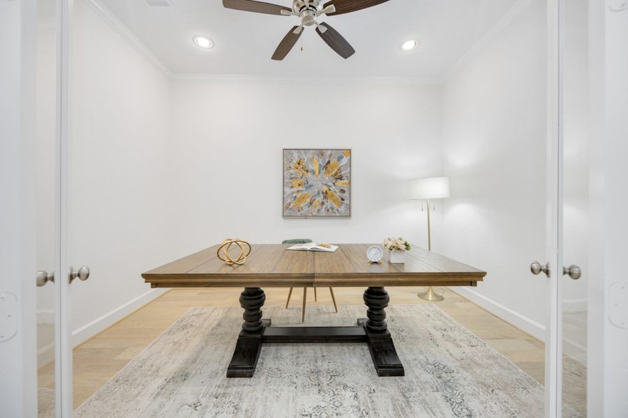 A Dreamy Spot for a Home OfficeNeed a quiet space to work or create? This glass-doored room near the entry is ideal for a study, Zoom room, or library—with just enough privacy to stay focused.