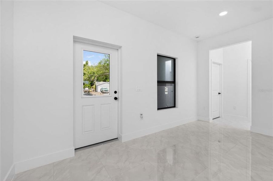 Spacious, unfurnished interior of a new home in , Port Charlotte (Image 46).