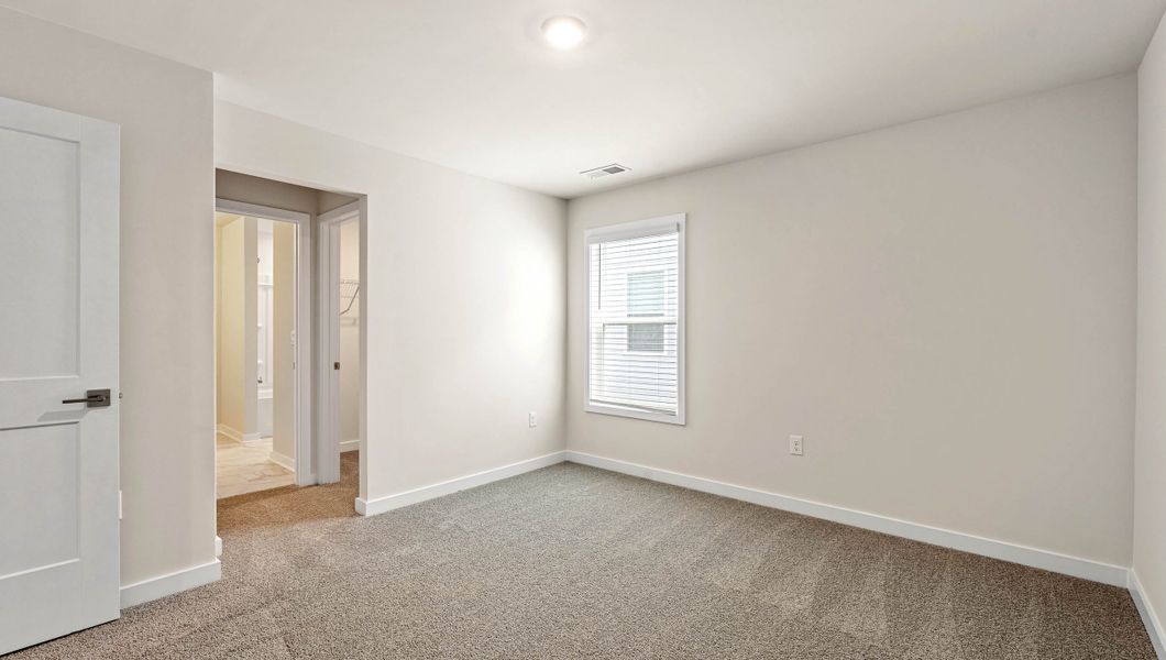 Spacious, unfurnished interior of a new home in Adams Glen, Greenville (Image 28).