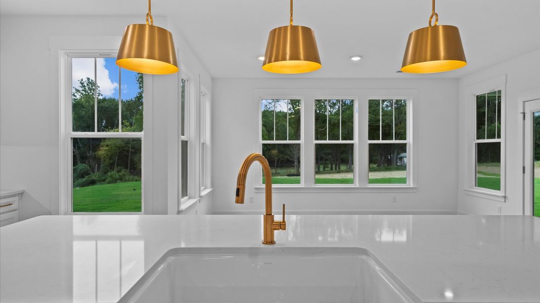 Accomplished layout with a stunning 10-foot island, pendant lighting, and superior craftsmanship