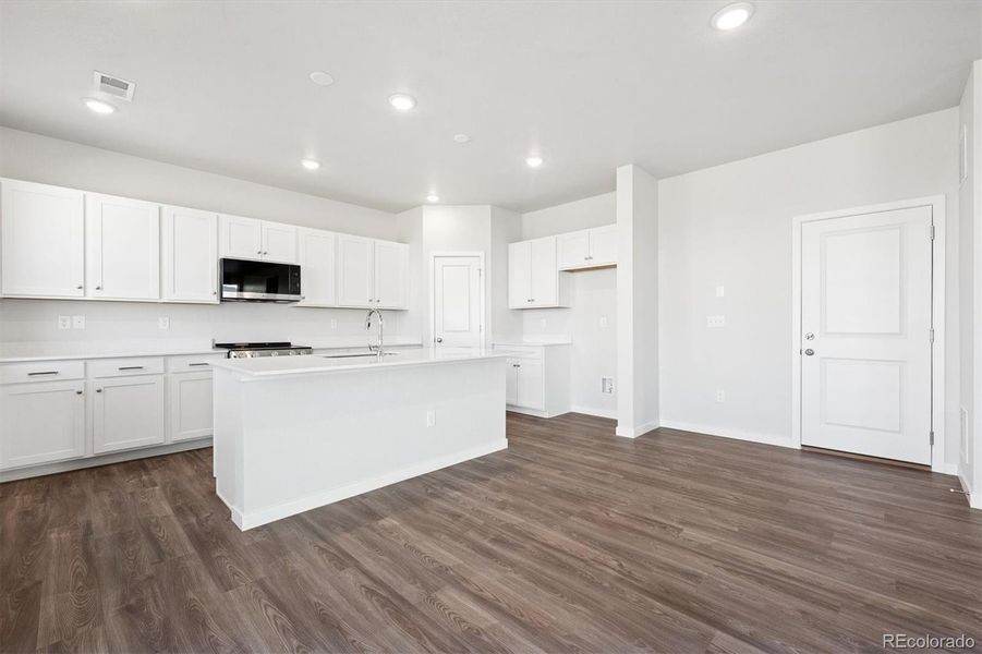 Furnished interior view inside a new home in The Aurora Highlands, Aurora (Image 10).